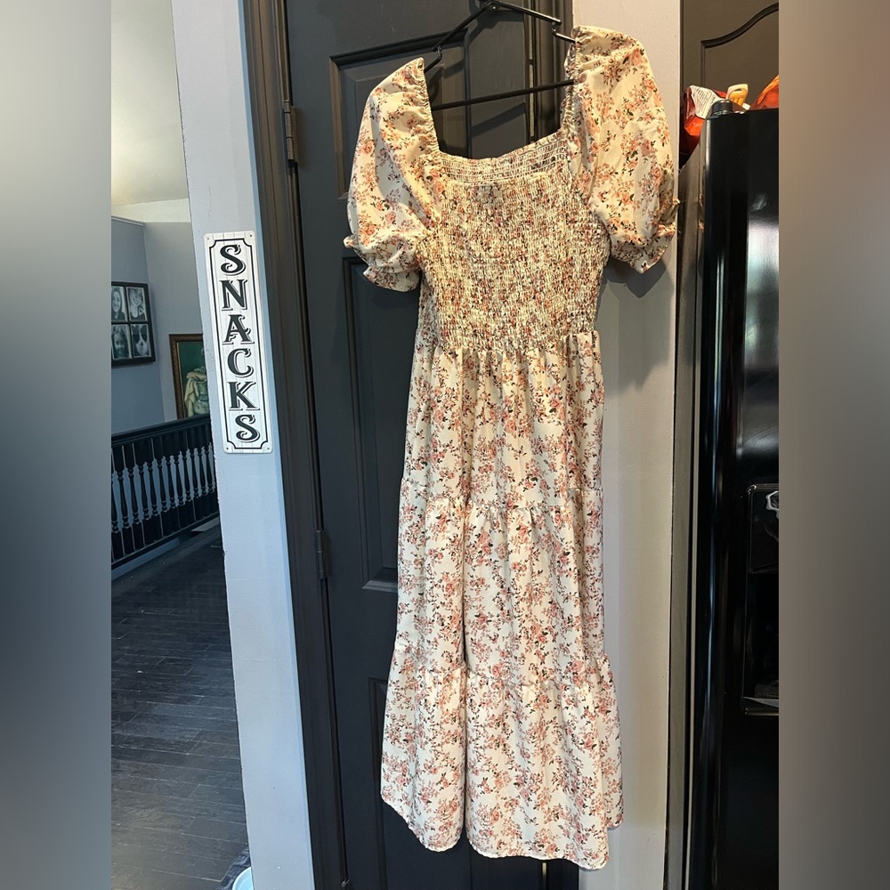 Super cute lightweight dress.